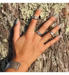 bague argent et pierre dorée