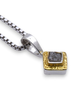 Petit pendentif argent et...